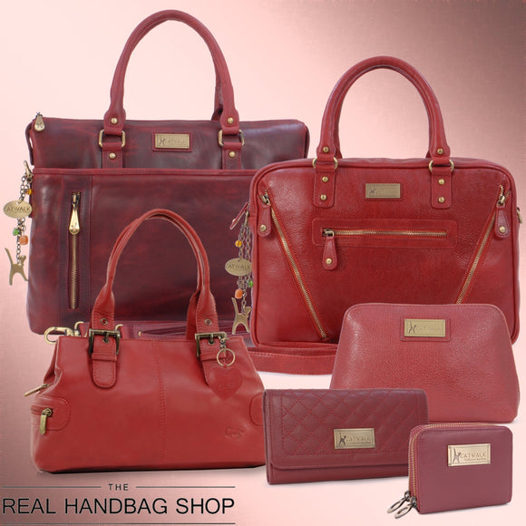 Collection of red leather handbags, purses and cosmetic bags.